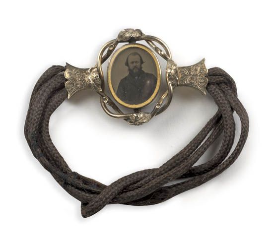 (PHOTOGRAPHIC JEWELRY) Sentimental (or mourning) hair bracelet with an ambrotype of a bearded gentleman,